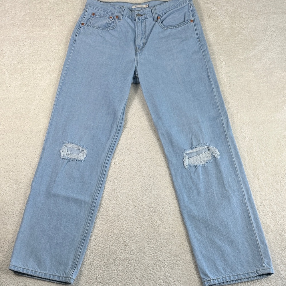 Levi’s jeans low pro Women's 30 Light Blue denim Straight Leg distressed knees
